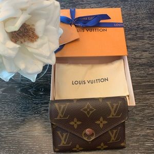 Louis Vuitton Victorine wallet.